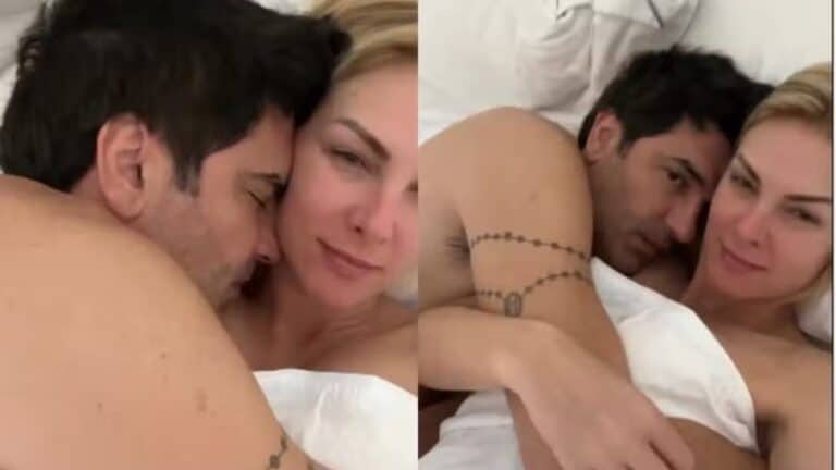 Foto de Edu Guedes sem camisa deitado na cama com Ana Hickmann