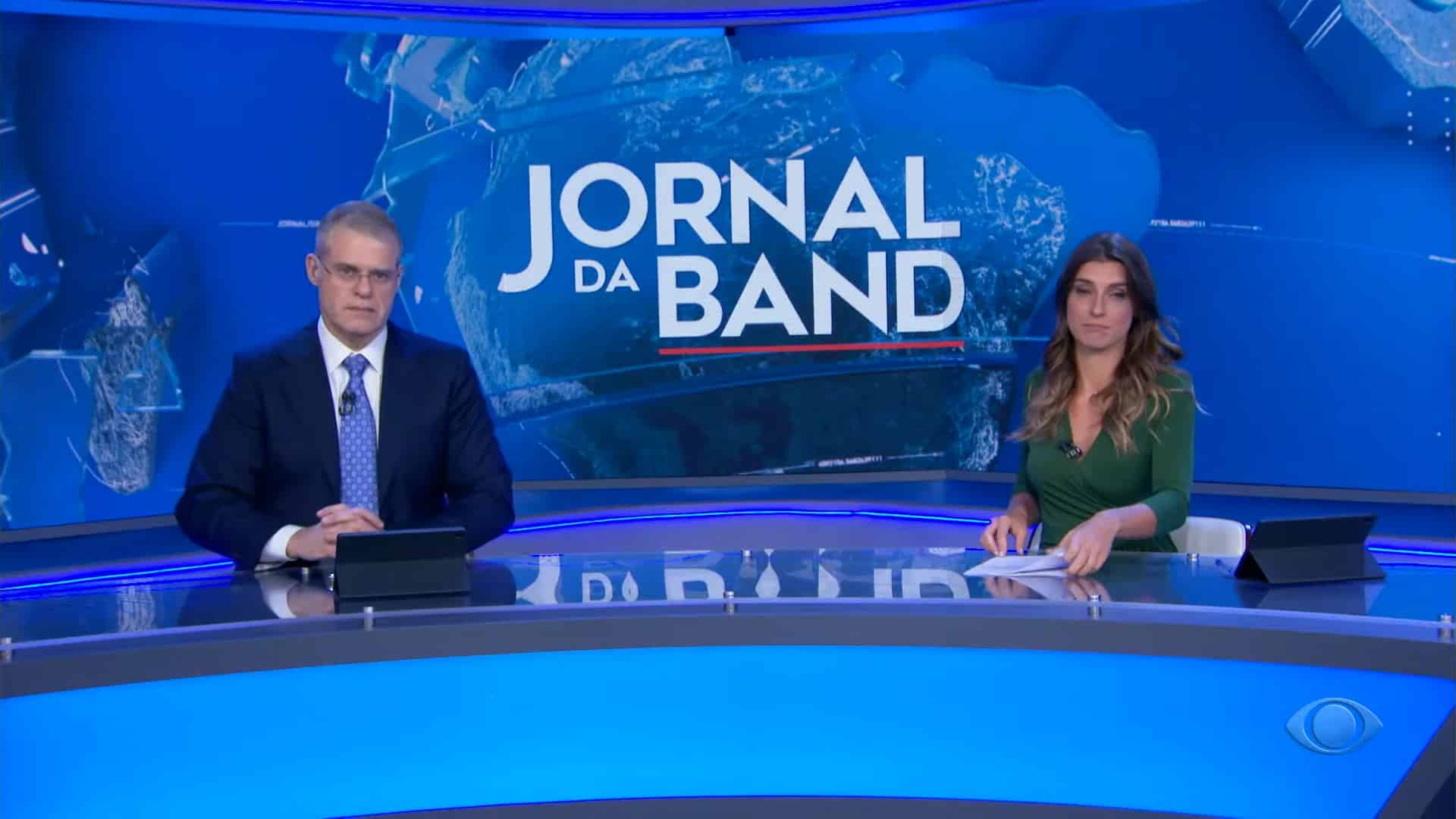 Foto de Eduardo Oinegue e Joana Treptow no Jornal da Band