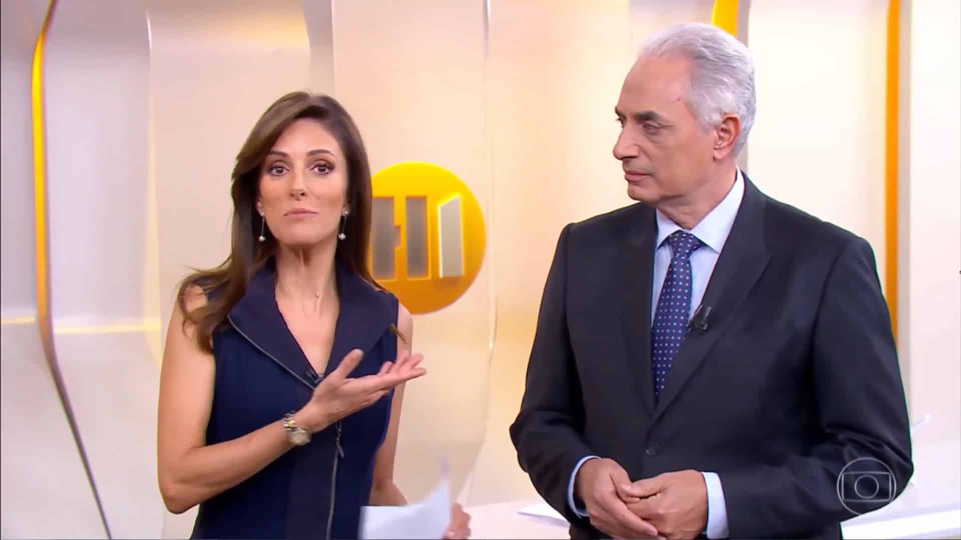 Foto de Monalisa Perrone e William Waack apresentando o Hora 1