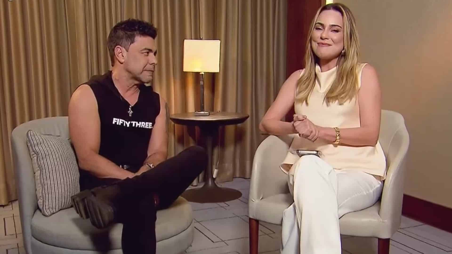 Foto de Rachel Sheherazade entrevistando Zezé Di Camargo no Domingo Record