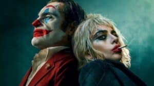 Foto de cartaz de Coringa 2, com Joaquin Phoenix e Lady Gaga com maquiagem de palhaço