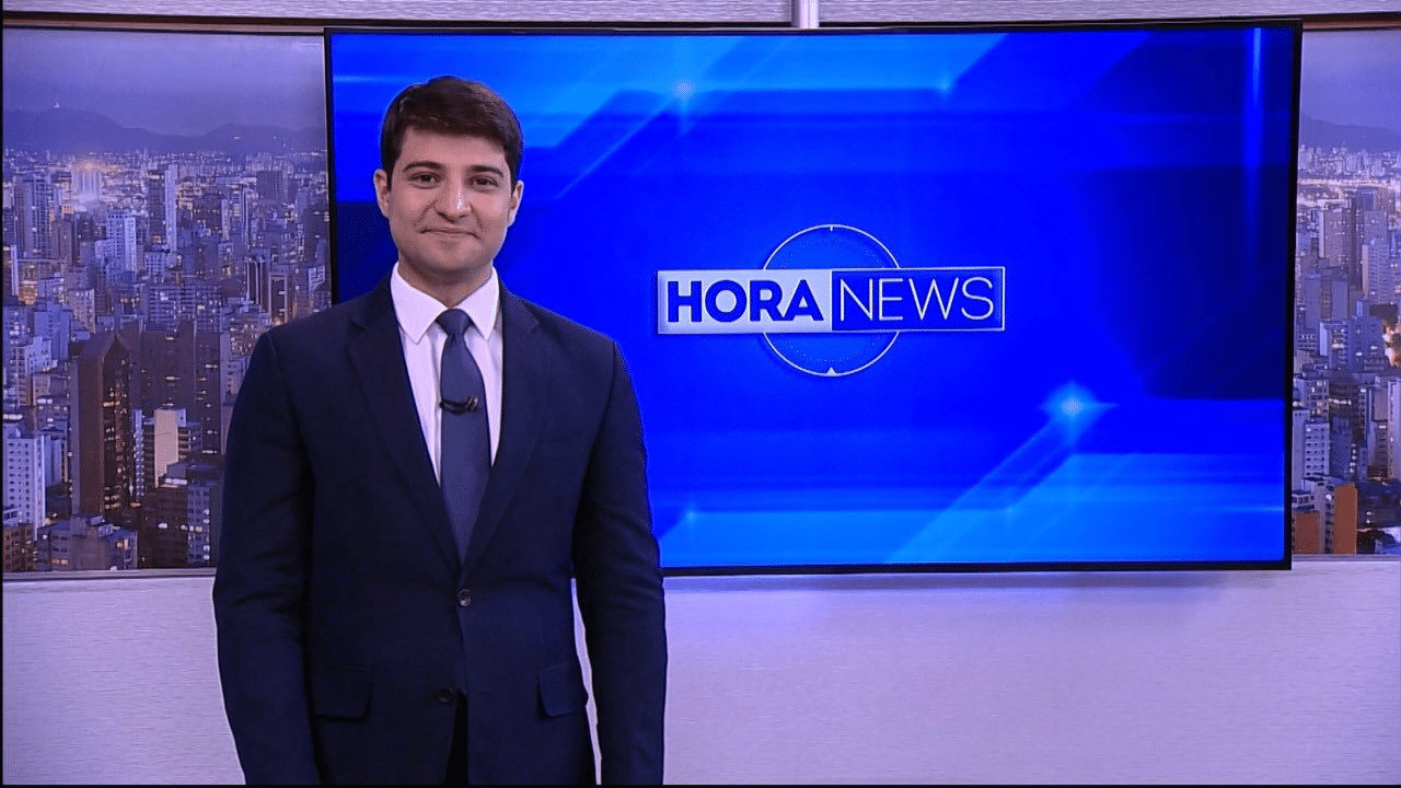 Imagem com foto do apresentador Rafael Algarte, da Record News