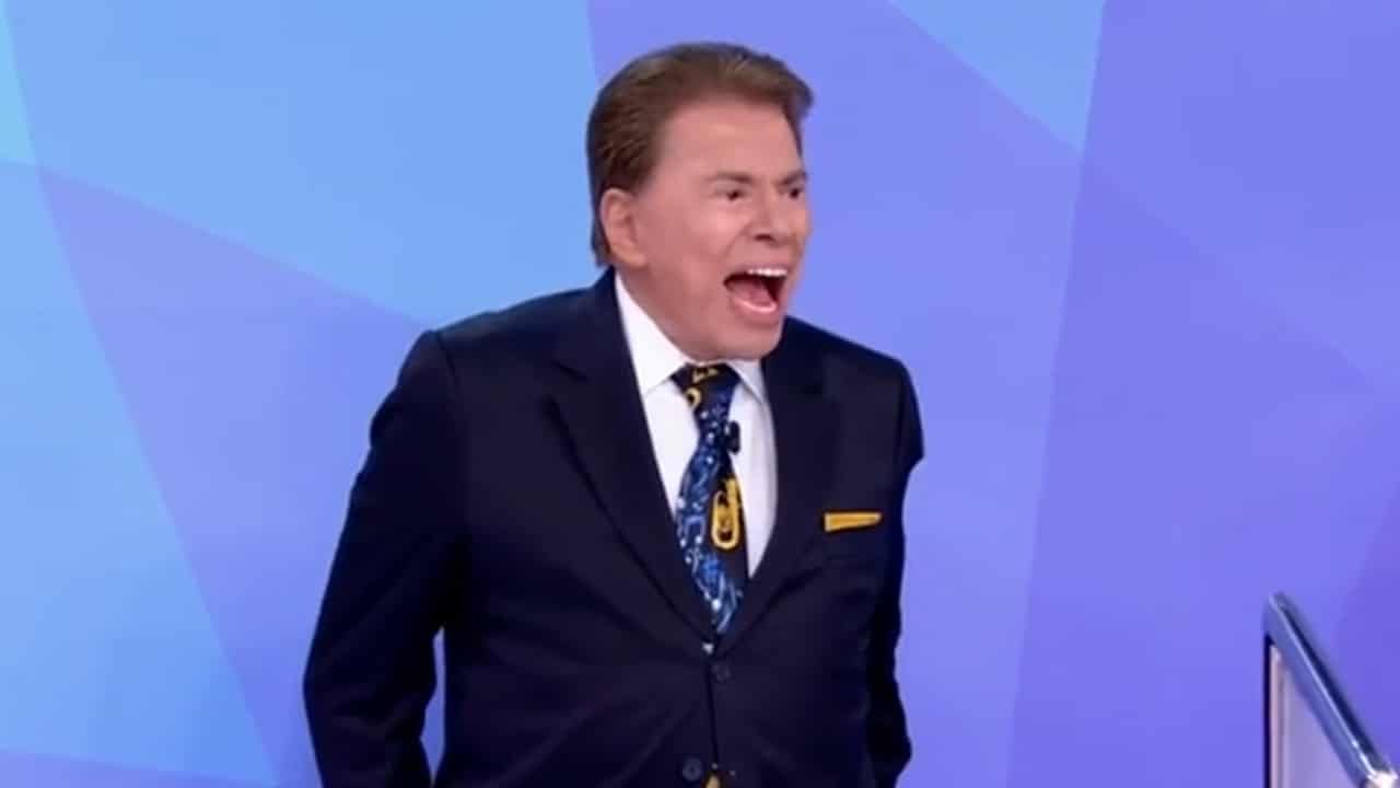 Imagem com foto de Silvio Santos levando choque durante o quadro Jogo dos Pontinhos do Programa Silvio Santos