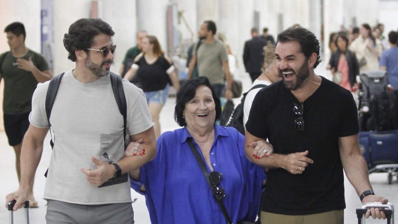 Foto Déa Lúcia e Marcelo Cosme no aeroporto