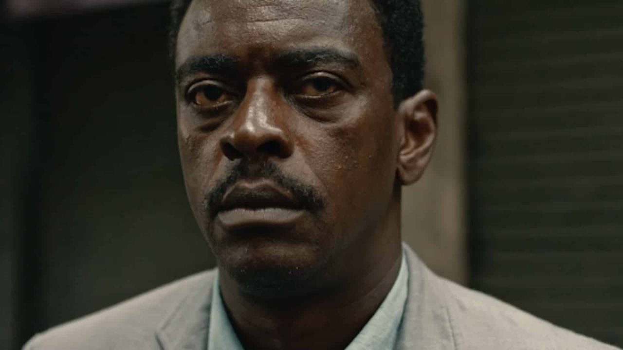 Foto de Seu Jorge caracterizado como Marighella, filme será exibido pela Globo