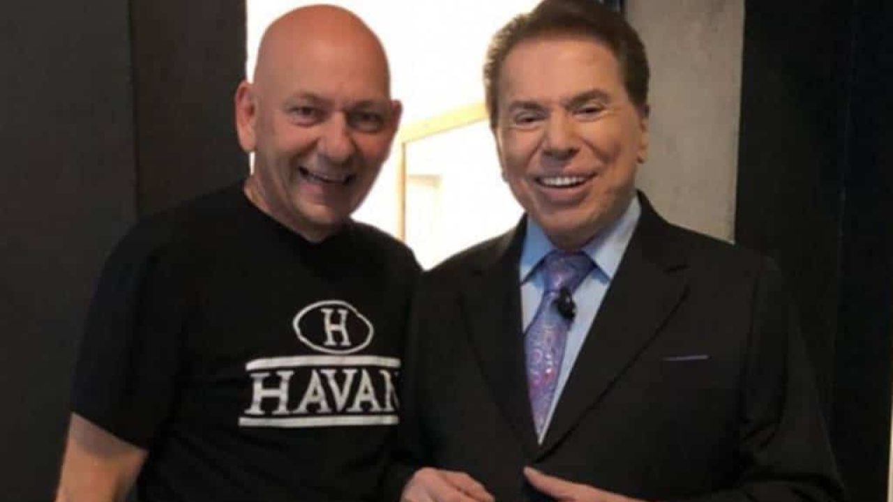 Silvio Santos, dono do SBT, posa ao lado de Luciano Hang